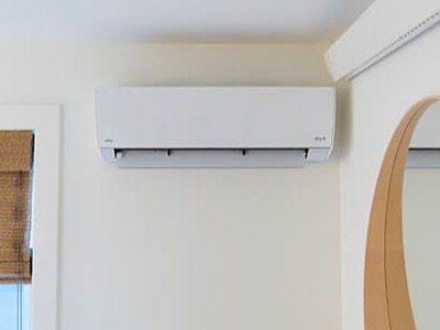 Heat pump on a wall.