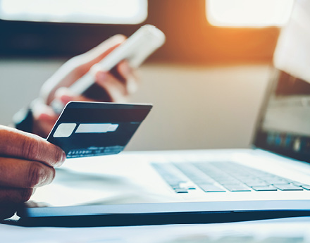 Person Holding A Credit Card